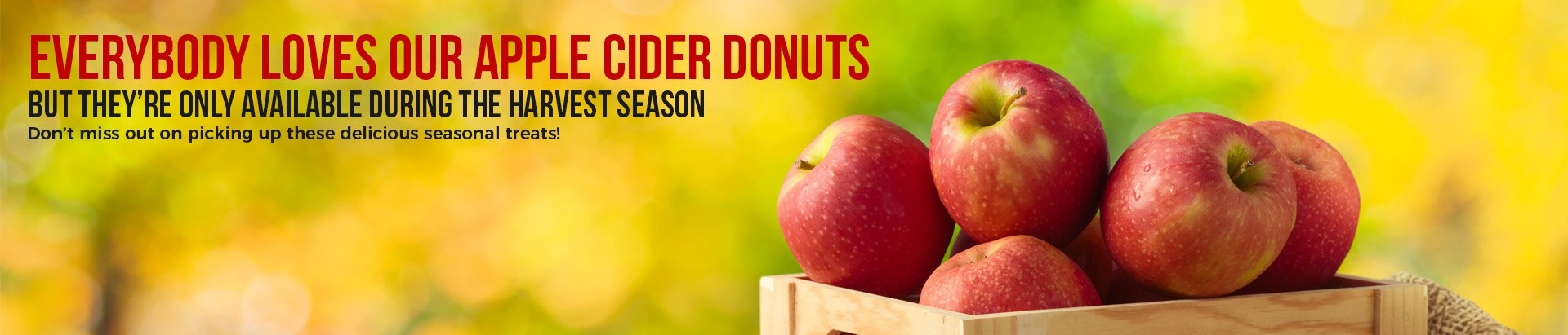 graphic of apples in a box with the words everybody loves our apple cider donuts but they're only available during the harvest season don't miss out on picking up these delicious seasonal treats!